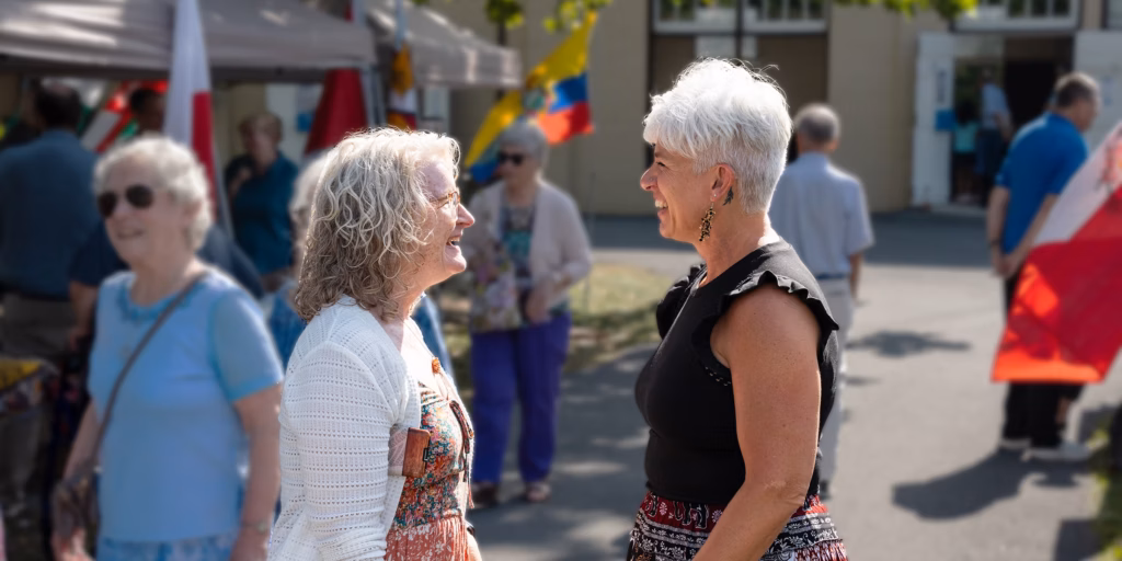 two women have a friendly conversation